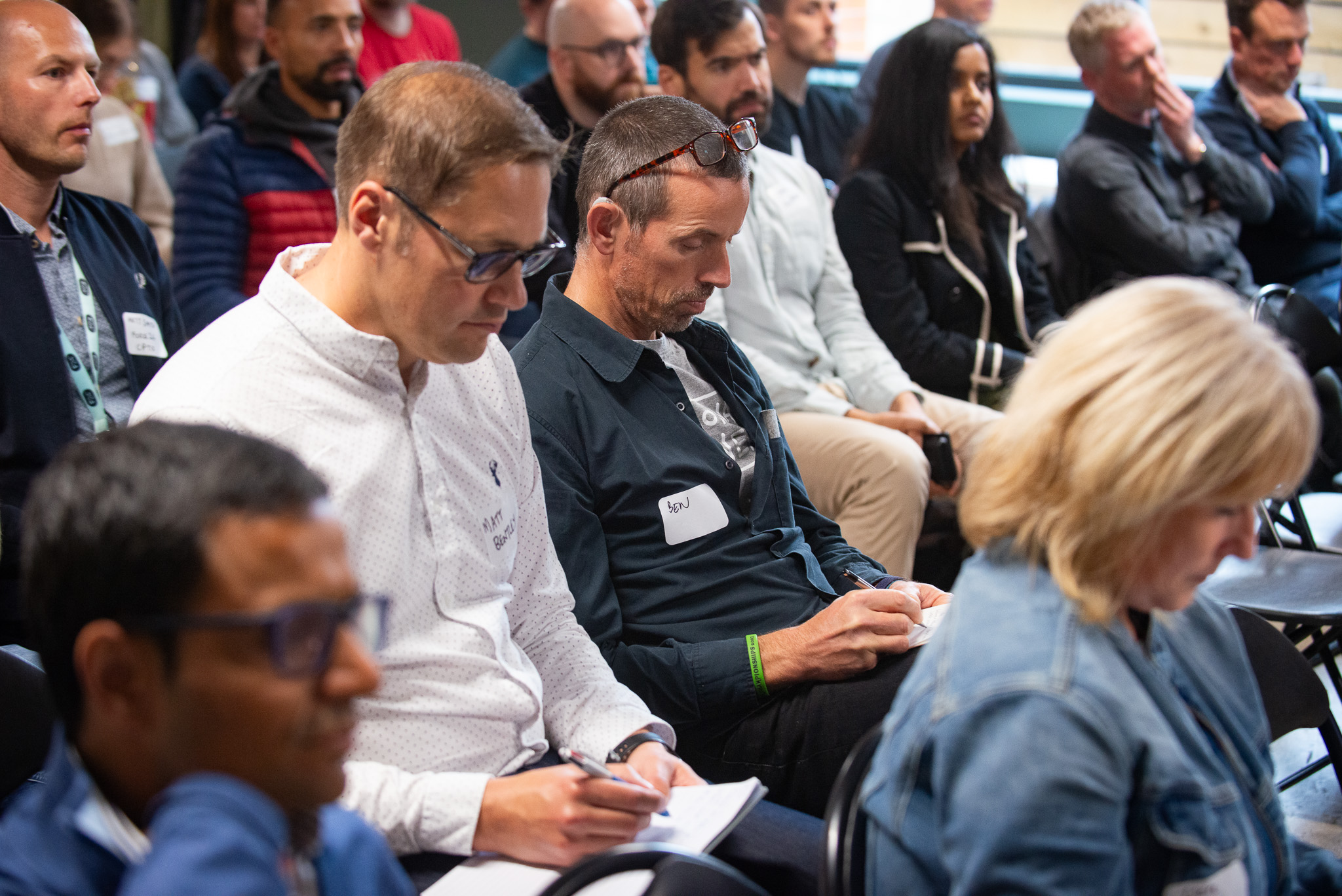 Audience taking notes